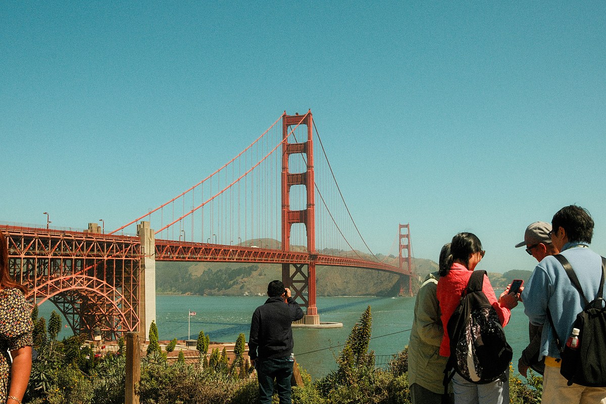 Visitors photograph the Golden Gate Bridge in San Francisco, one of the 2026 World Cup host cities